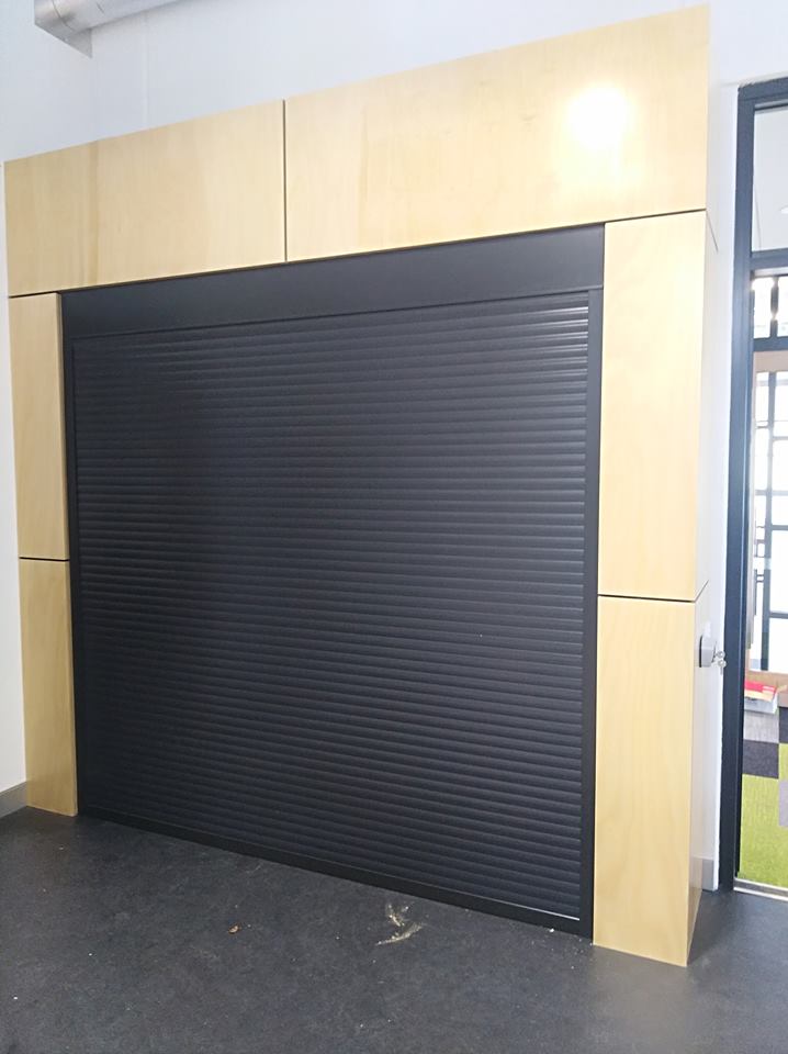 Lesmurdie roller shutter fitted over a cabinet opening in a school class room