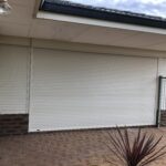 shows a picture of a roller shutter over a door